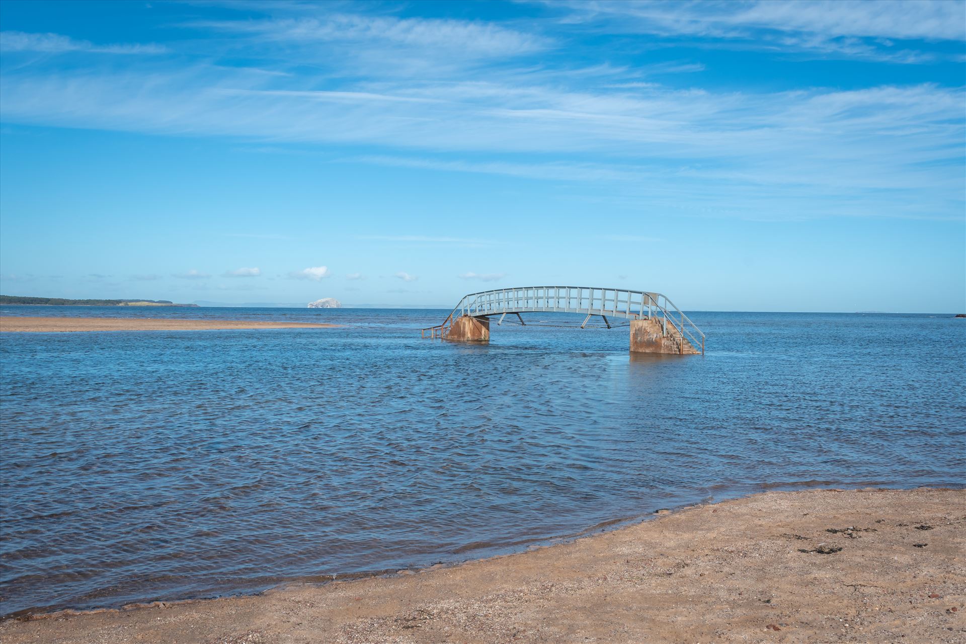 'Bridge to Nowhere’, Dunbar, ScotlandWhen the tide comes surging into shore, what should be an easy path to the beach becomes suddenly impassable. At high tide, the water swallows the land around the bridge, making it look as though it’s stranded in the middle of a sea.