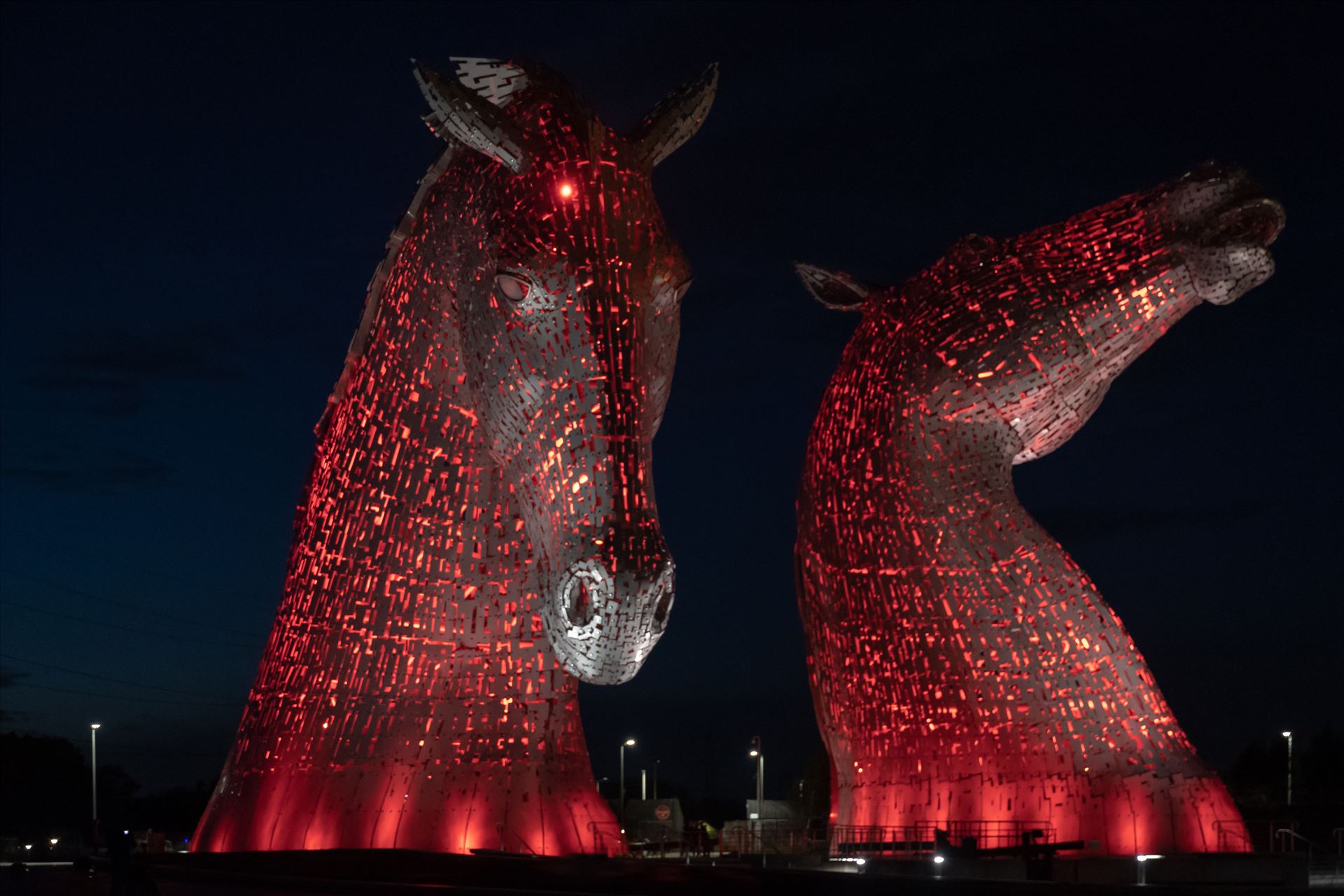 The Kelpies, Falkirk, Scotland - Red - Built of structural steel with a stainless steel cladding, The Kelpies are 30 metres high and weigh 300 tonnes each. Construction began in June 2013 by Graham Dobson Photography