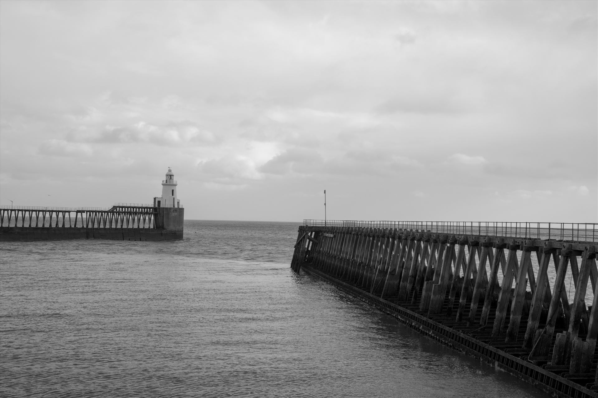 Blyth Pier and lighthouse, Northumberland, in B/W